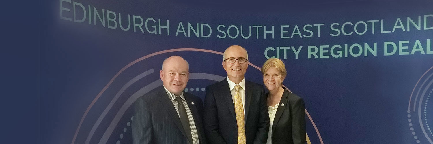 Malcom Cutt posing with representatives from Edinburgh City Region Deal
