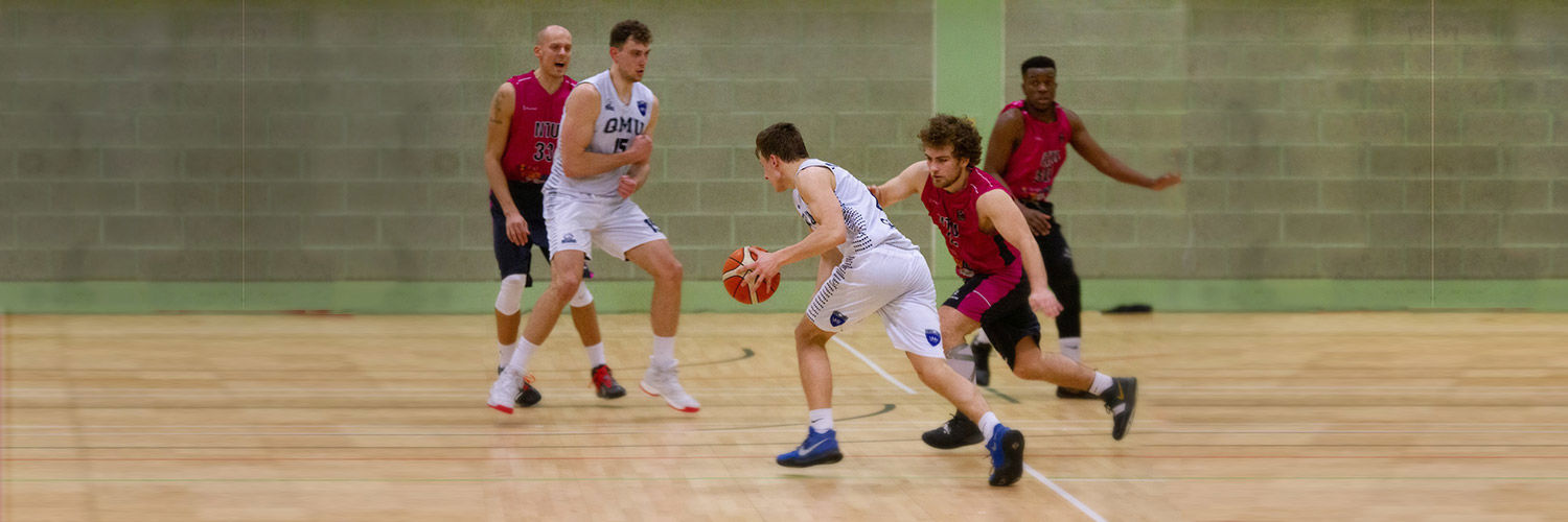 Men playing basketball at QMU, Edinburgh