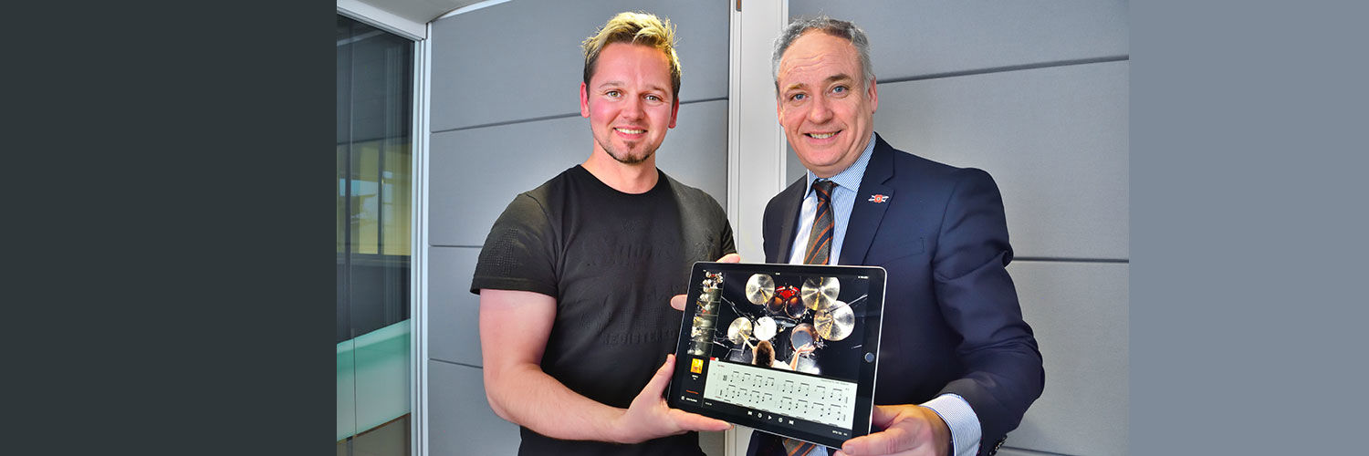 QMU student Ross Brydon and Richard Lochhead MSP
