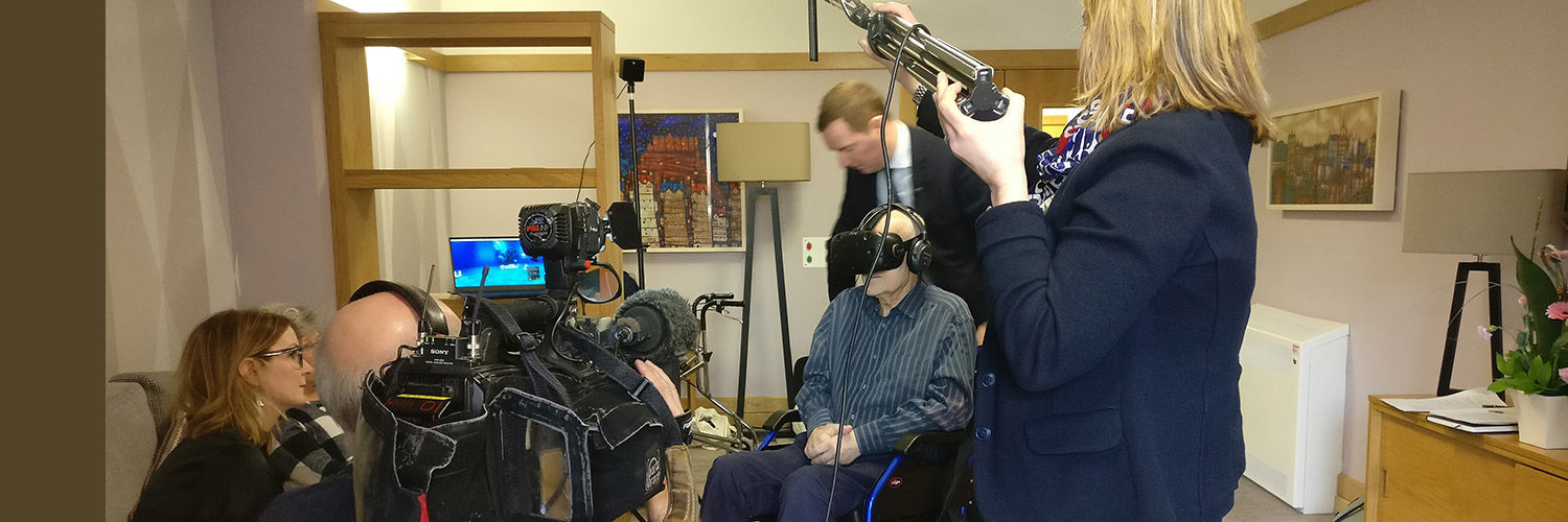 A patient in a wheelchair experiencing VR