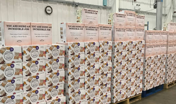 A large wall of biscuit boxes