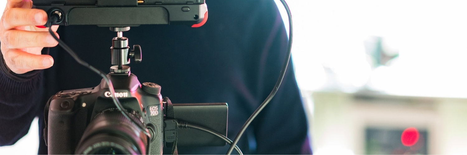 A QMU student operating state-of-the-art film equipment