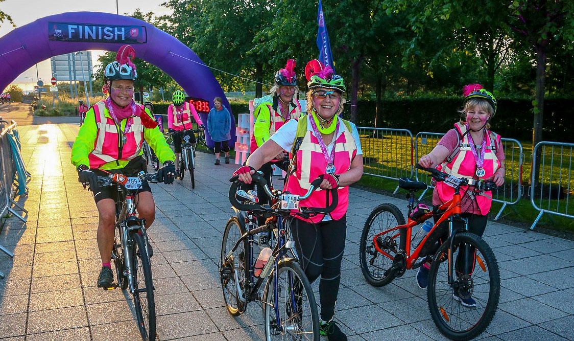 Cheerful participants of Ride the Night