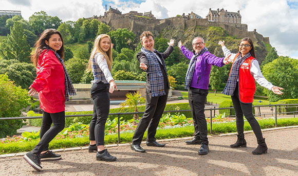 Members of QMU STARS programme pose in front of Edinburgh Castle