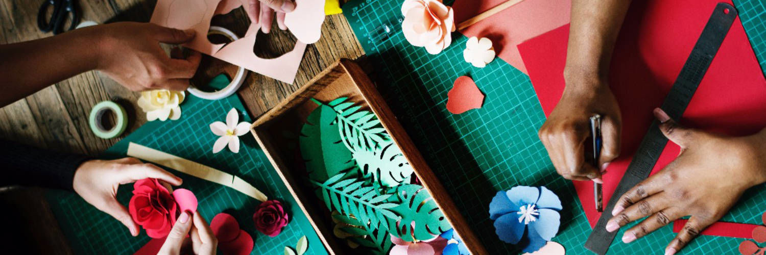 Close up of two people crafting together
