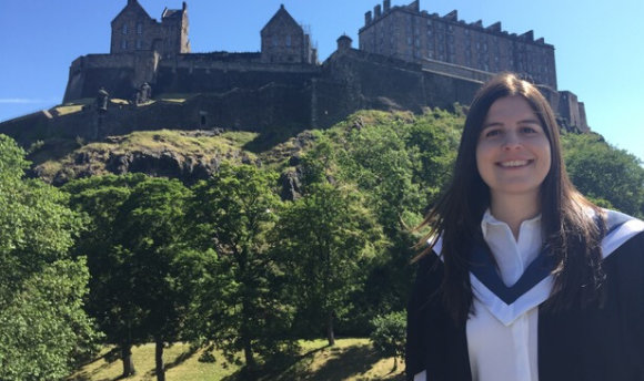 Alexia Mitchell standing next to Edinburgh Castle