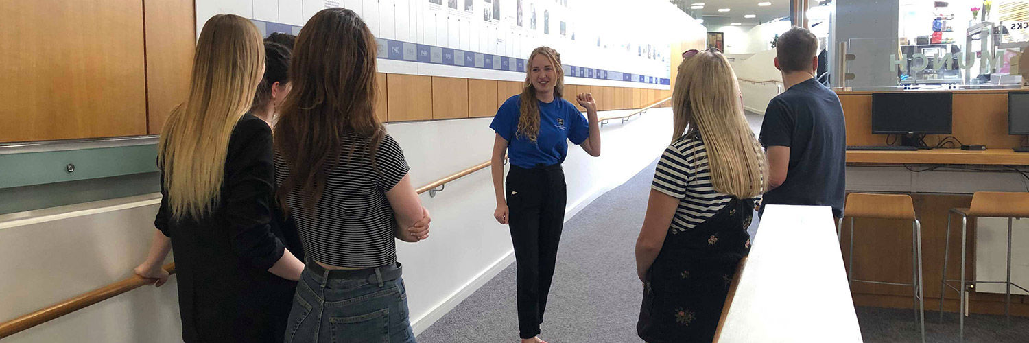 Jessica Vetters giving a tour on a QMU open day