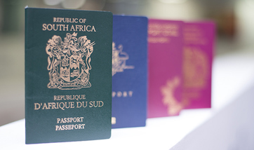 A row of different passports from different countries