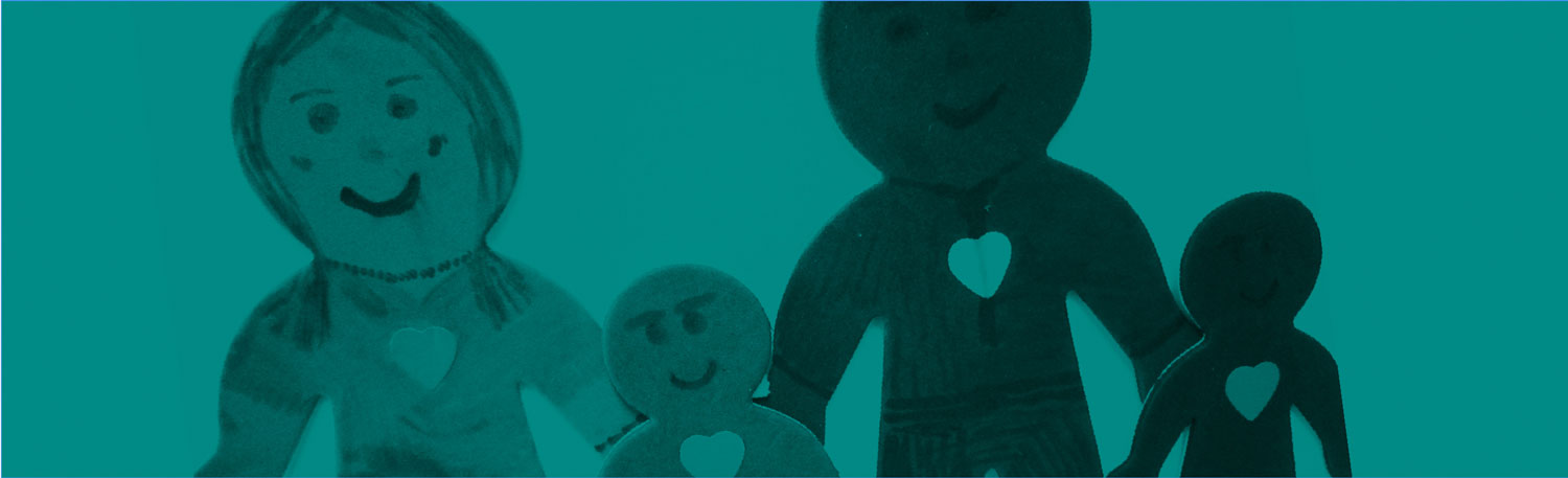 B+W photo of a child's drawing of a family with hearts on their chests