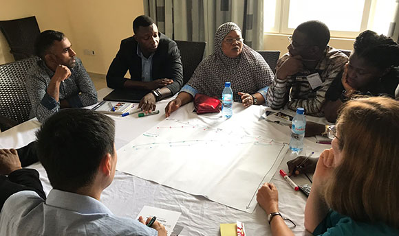 A group of people having a meeting