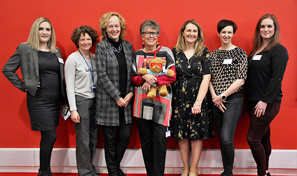 Prue Leith, Chancellor of Queen Margaret University and a row of female staff members
