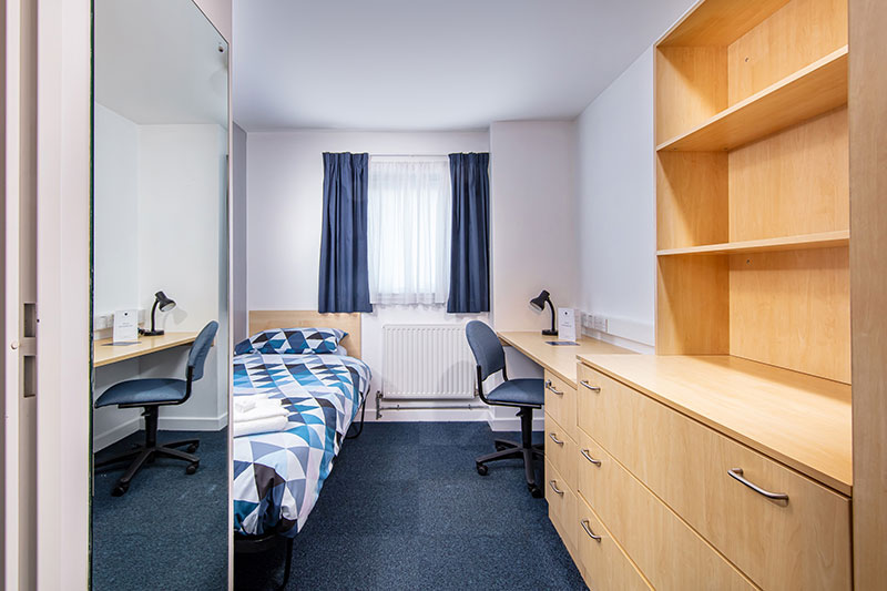 A clean, bright, single room on the QMU campus