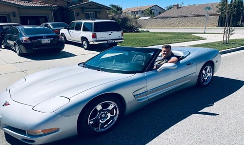 Image of Ignas in a sports car