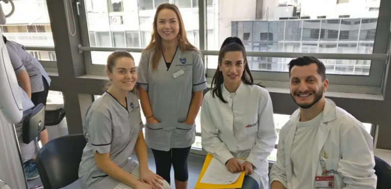 Podiatry students from Queen Margaret University, Edinburgh and Metropolitan College, Greece pose for a photo together.