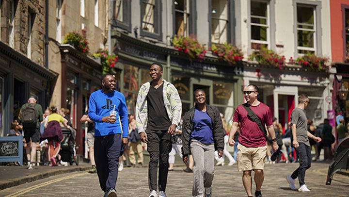 International students walking through the streets of Edinburgh