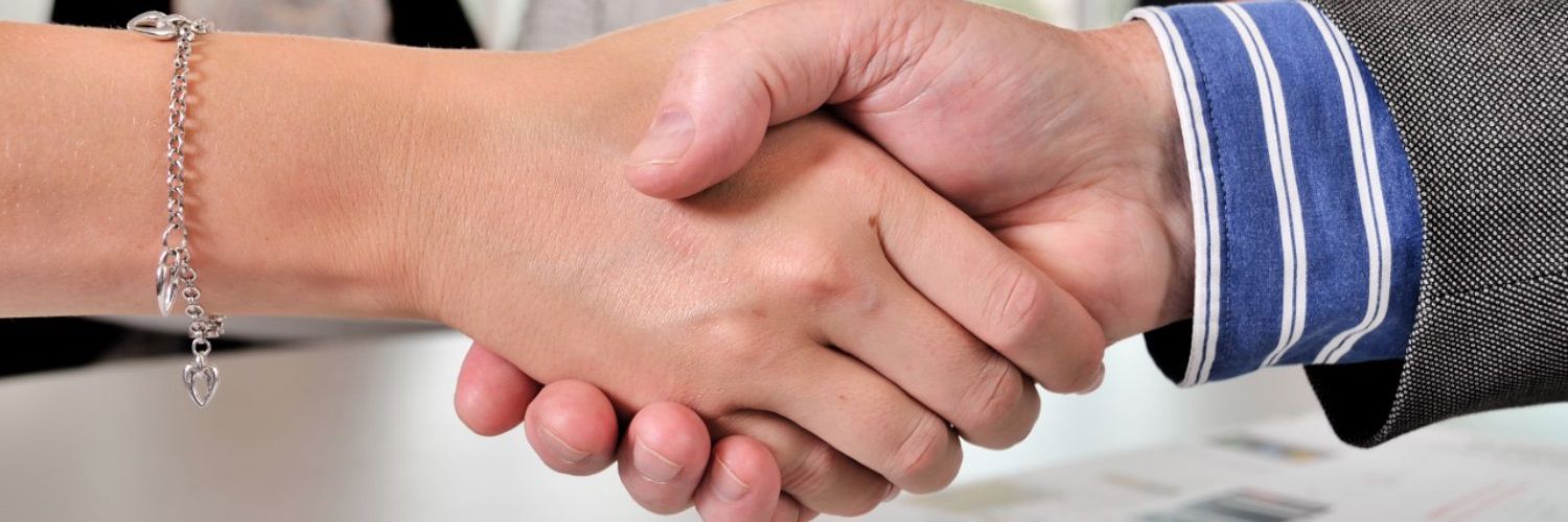 Image of hand shaking 