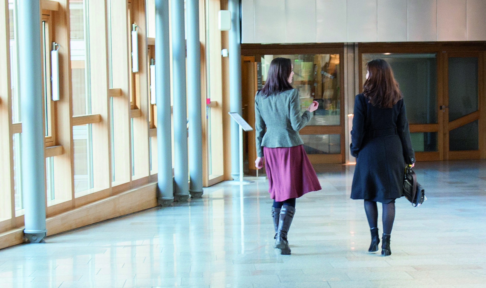 Women walking down corridor in Scottish parliament building
