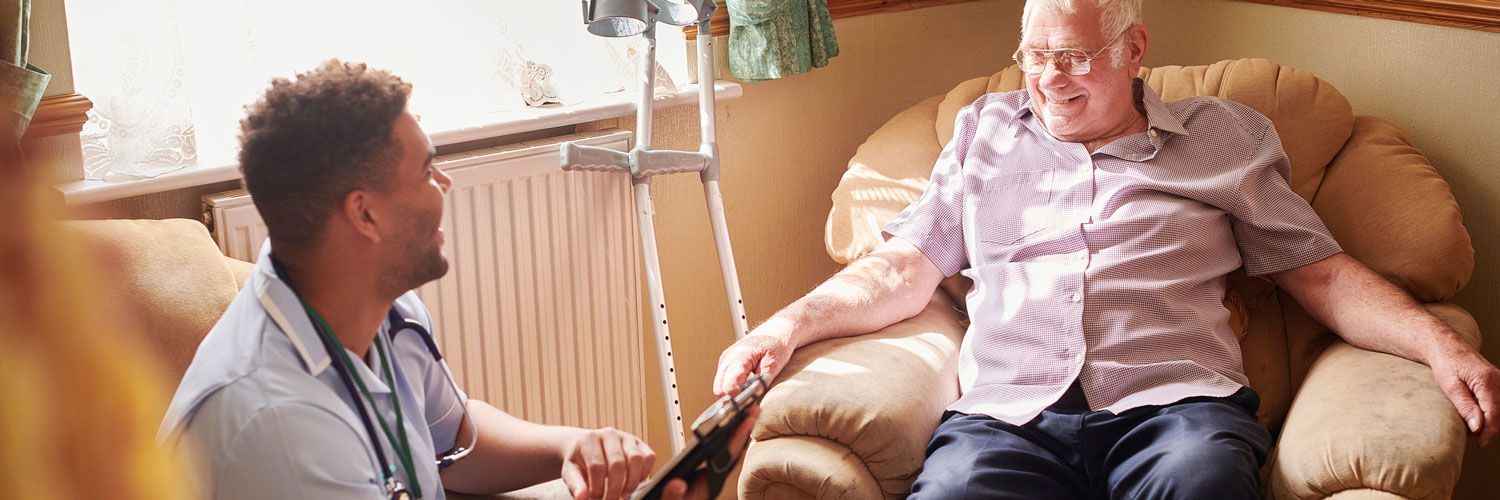 Nurse and elderly man