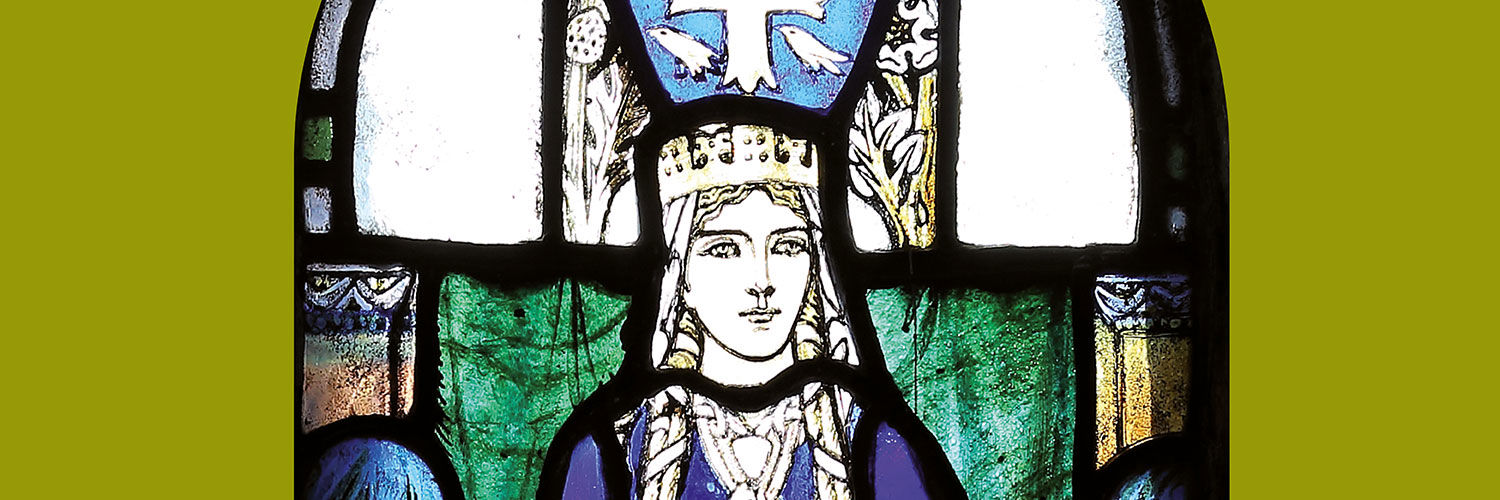 A close up of a stained glass portrait of Saint Margaret.