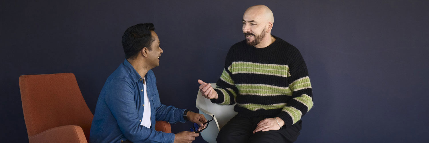 A student speaking to a member of the Student Services team.