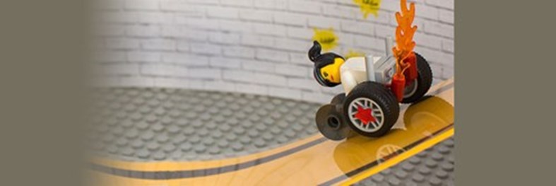 Modern lego wheelchair with flames coming out of the back