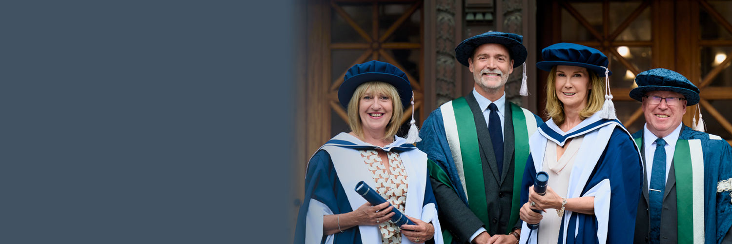 Susan Black, Professor Carolyn McDonald, Chancellor Patrick Grant and Principal Sir Paul Grice atop the steps at Usher Hall.