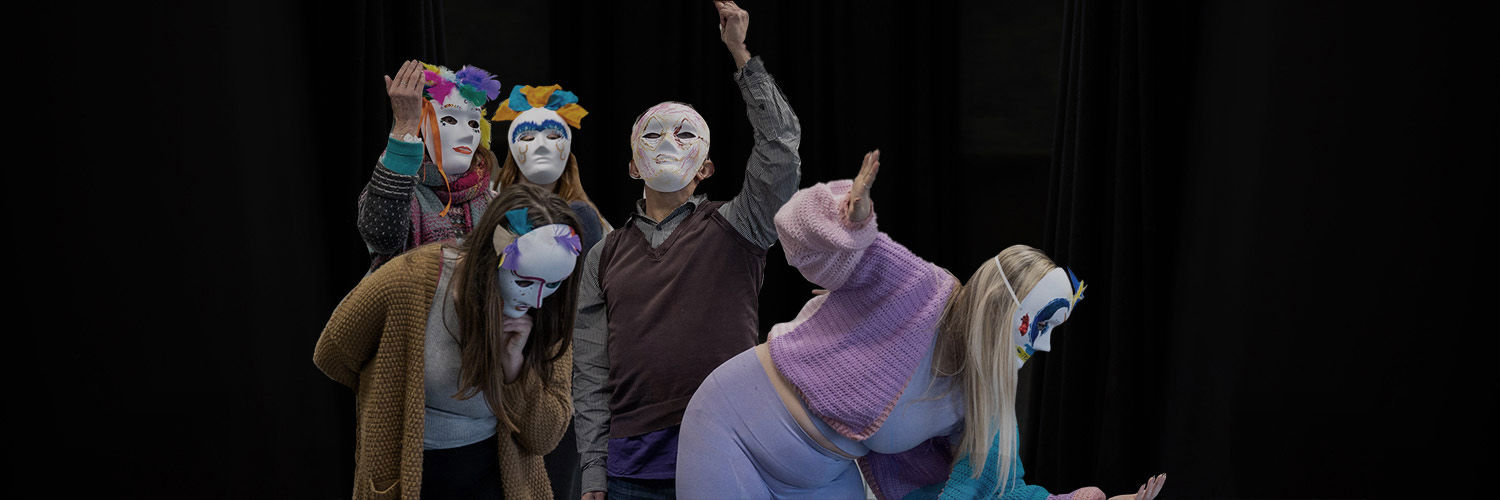 Drama Therapy students performing in masks