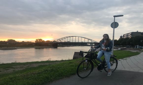 Scenic image of Martina on a bike