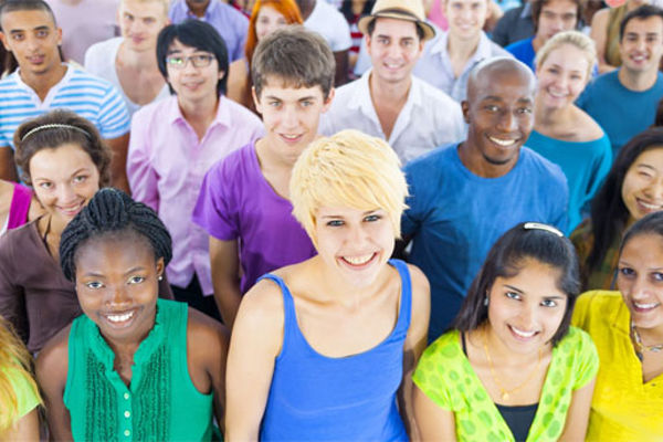 A group of young people looking directly at the camera