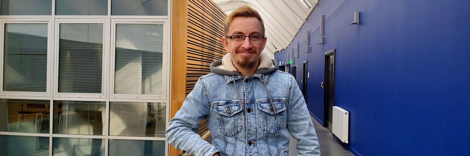 Nicholas Flynn on the third floor of the QMU campus