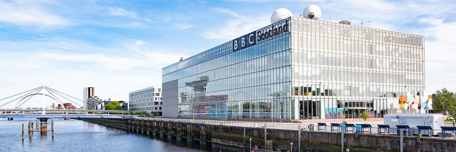 Panorama of the BBC Scotland building at the Pacific Quay, Glasgow on a sunny day