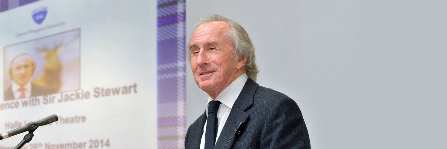 Sir Jackie Stewart, three-time Formula 1 world champion, delivering a talk at Queen Margaret University.