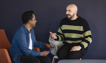 A student speaking to a member of the Student Services team.