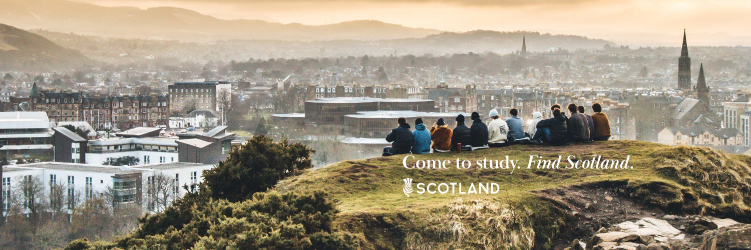 Students sitting on top of Arthur's Seat in Edinburgh "Come to Study. Find Scotland" 