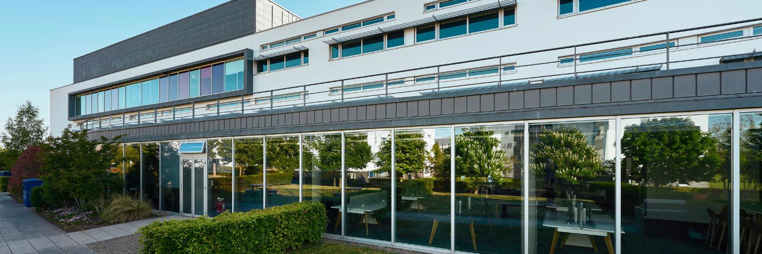 Exterior shot of the main QMU campus building