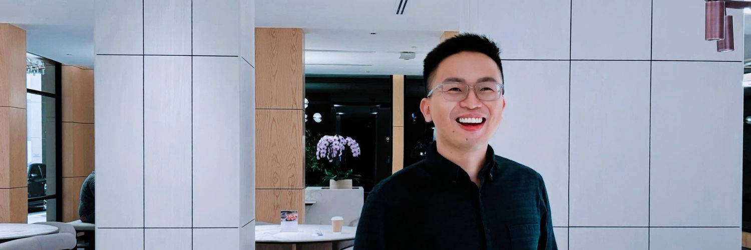student Tu Tuan Cuong in an office