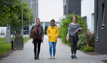 Some QMU students walking on campus