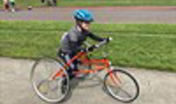 Child taking part in race running event