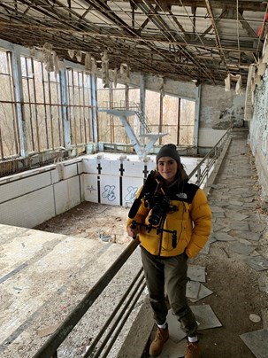 Photograph of Alexandra Gilbert on location in the Chernobyl Exclusion Zone