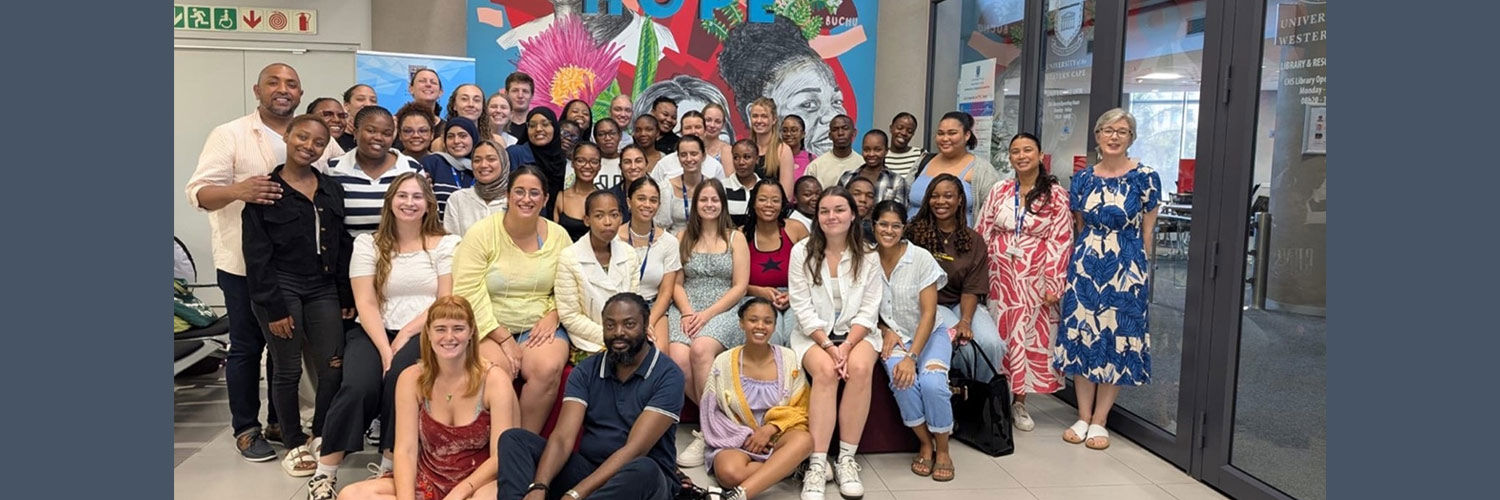 A large group of people posing for a photo together