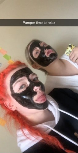 Image of Rebekka and friend with facemasks on - Pamper time