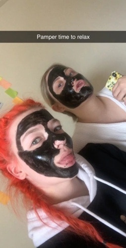 Image of Rebekka and friend with facemasks on - Pamper time