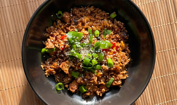 A bowl of chicken fried rice