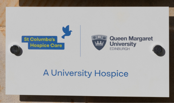 Outside signage displaying new University Hospice title