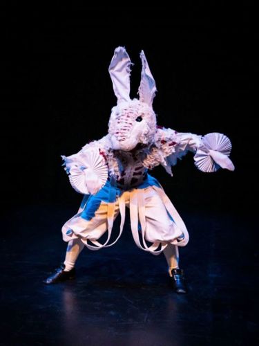 Performer on stage wearing rabbit costume