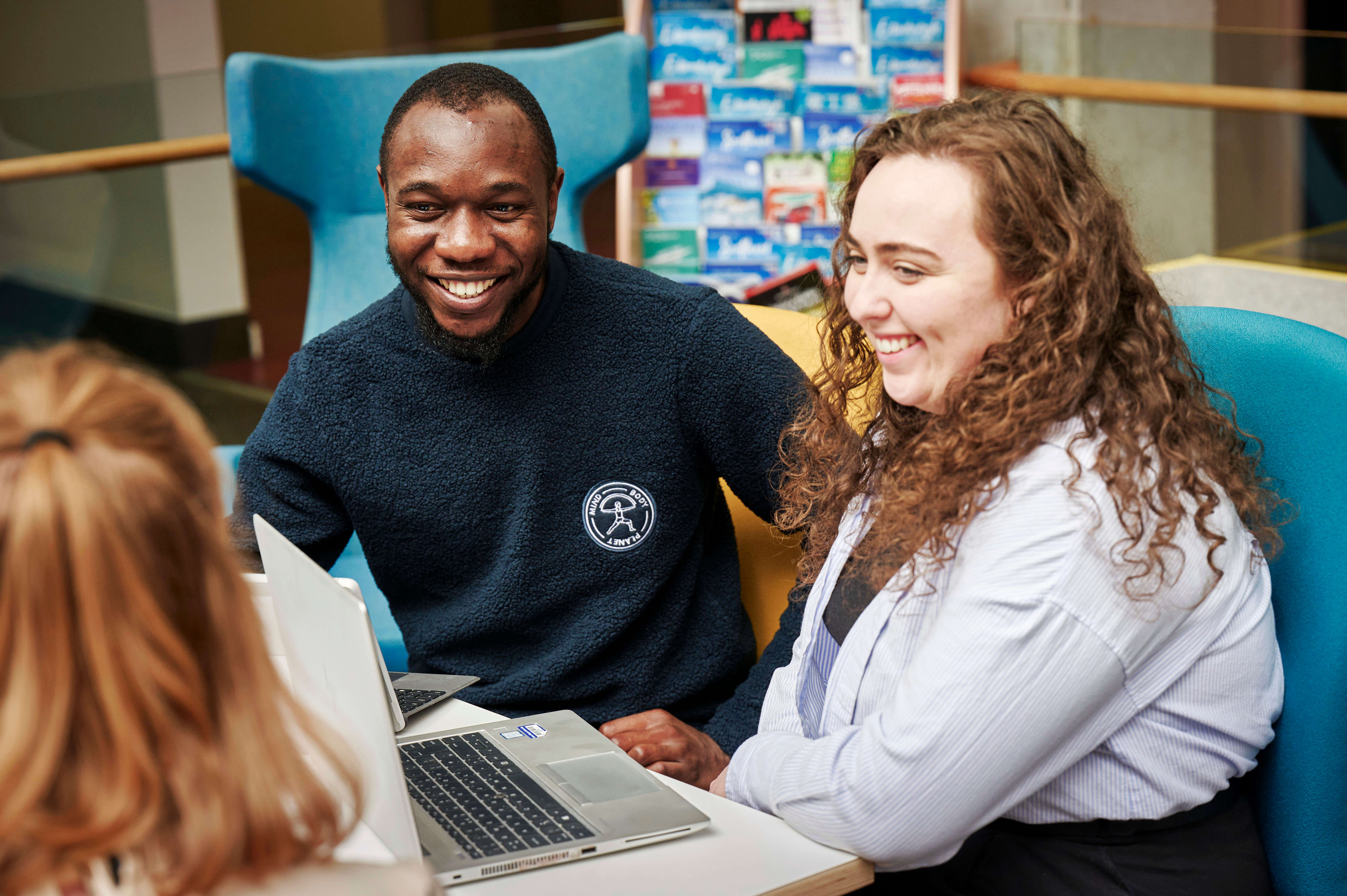 Three students talking
