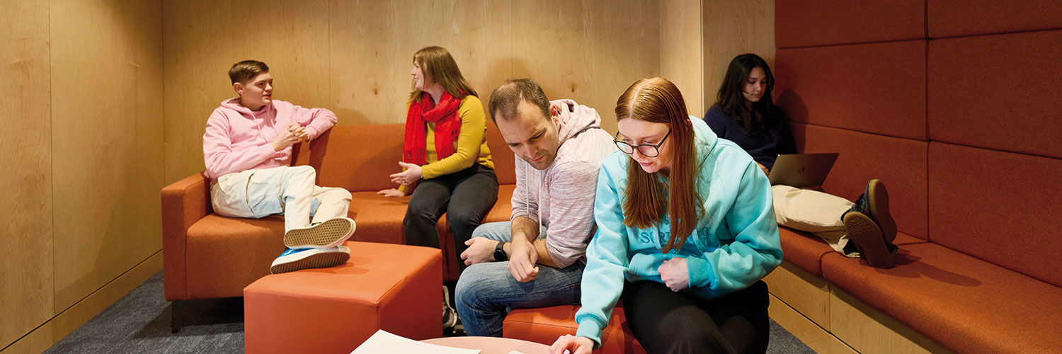 A group of students working together in the new library space.