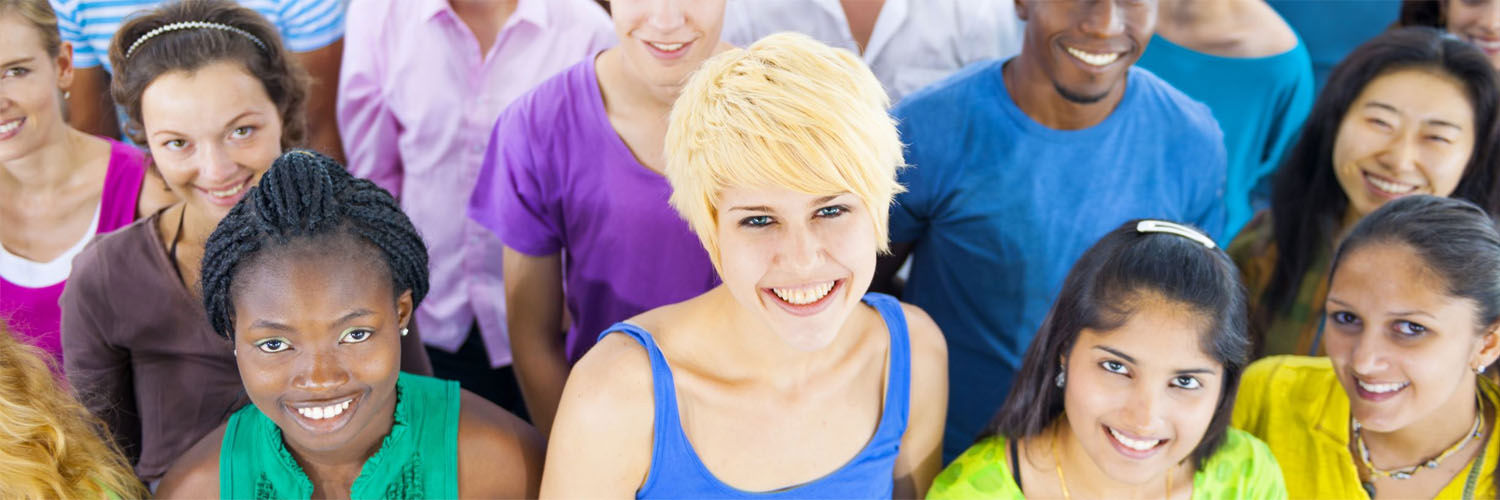 A group of young people looking directly at the camera
