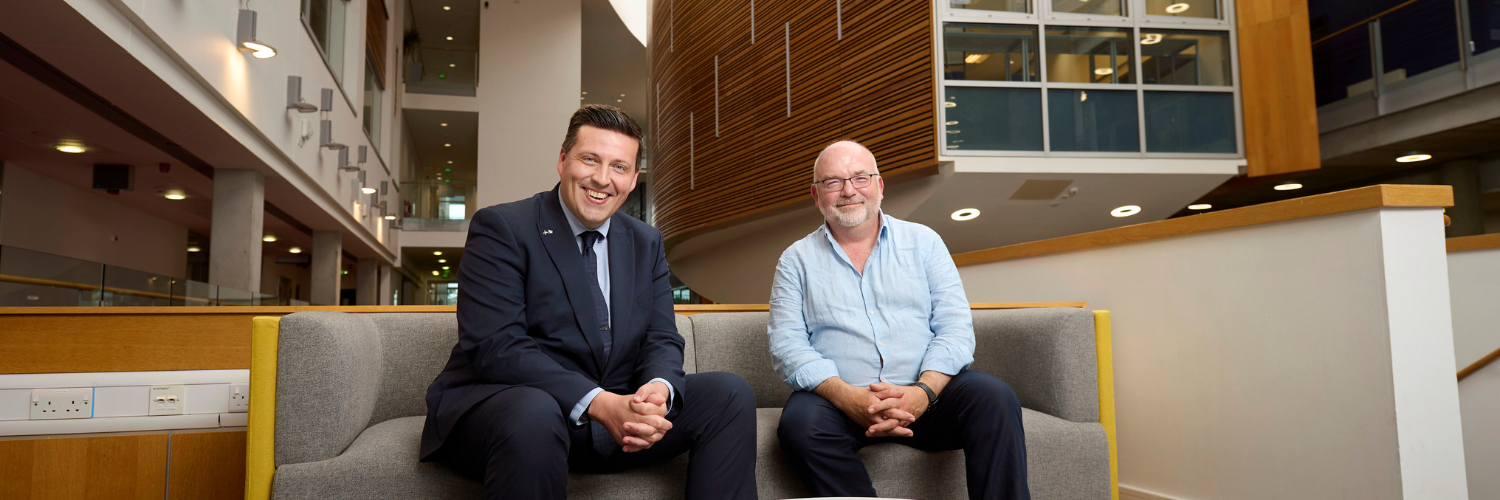 Scottish Government minister for higher education, Jamie Hepburn, meets with Queen Margaret University lecturer Patrick Boxall on campus.