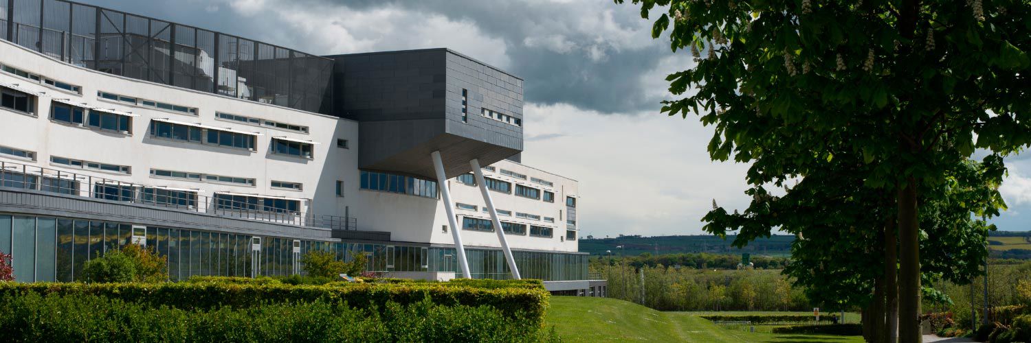 Exterior shot of the QMU campus building.